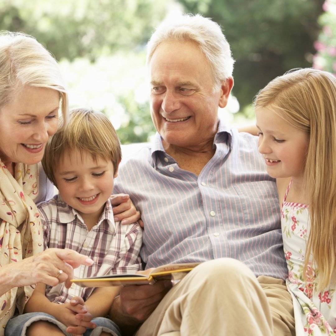 imgi_1_elderly-couple-reading-two-kids.jpg